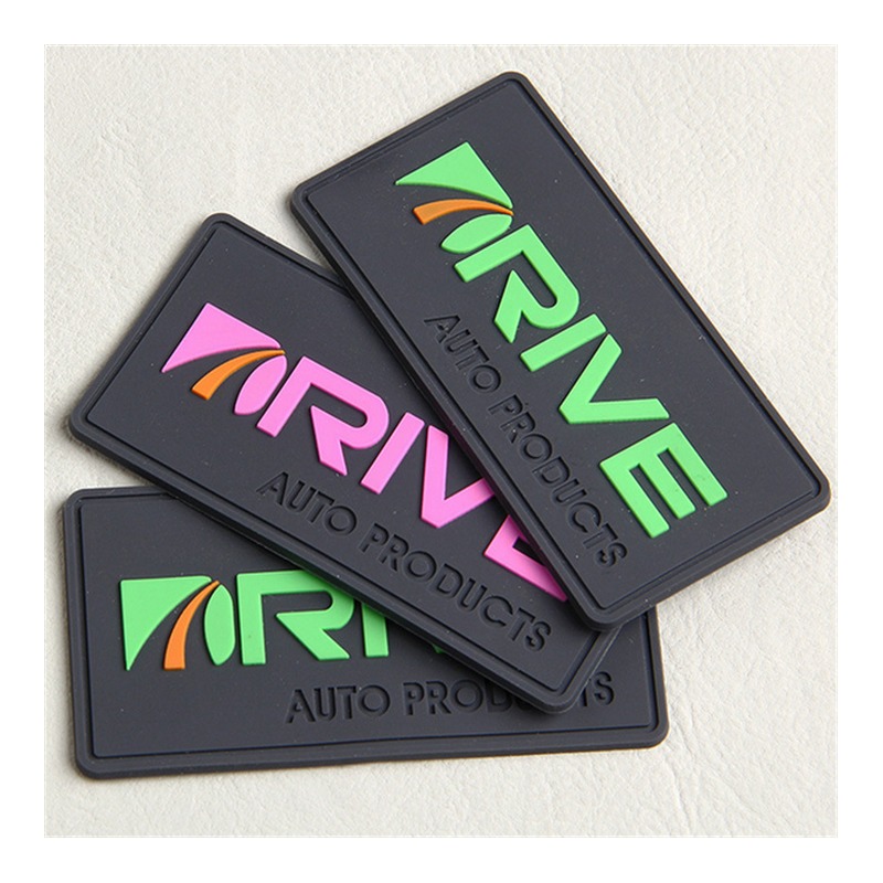 Two-Stage Co-Molded Soft / Rigid Hybrid Badge footwear trim style